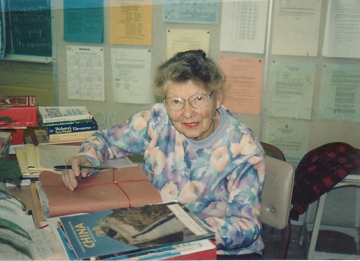 Woman seated at work desk